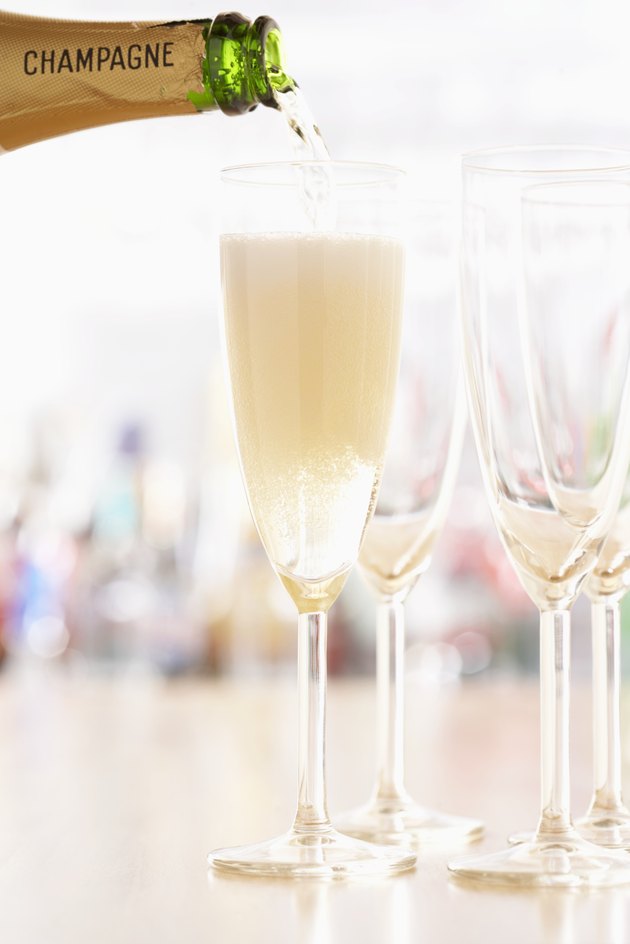 Champagne pouring into glasses