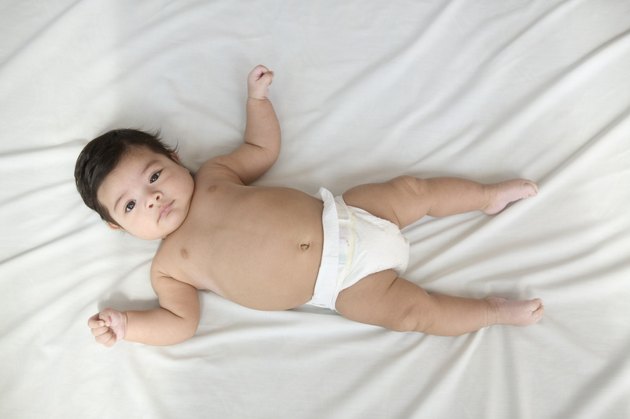 Portrait of a baby boy lying on his back