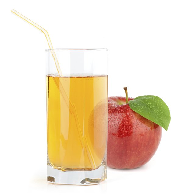 red apple with juice