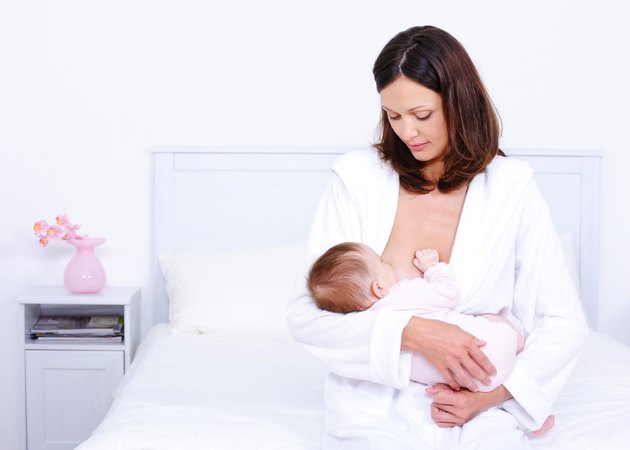 Mother feeding baby with breast