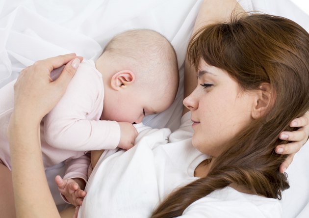 mother breast feeding her child