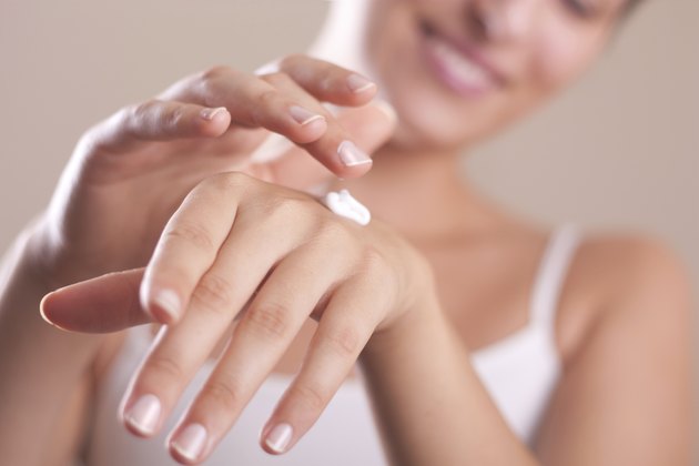 applying hand lotion