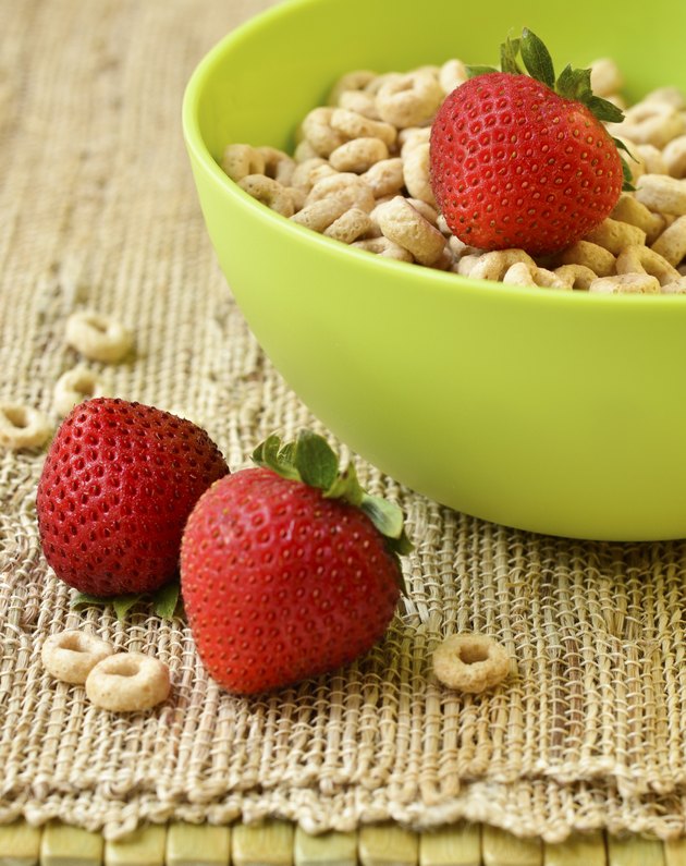 Bowl of cheerios with strawberries