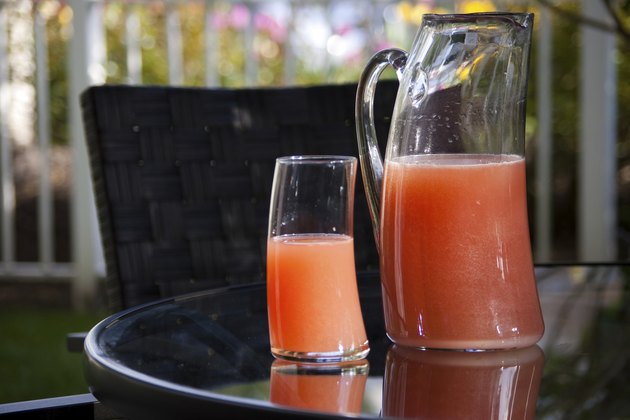 Cranberry Fizz Cocktail Drink in single glass and pitcher