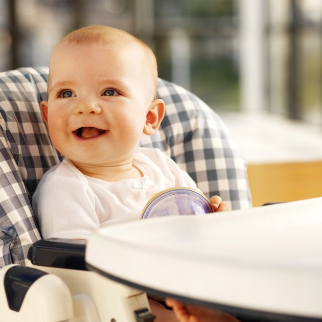 baby (12-18 months) sitting in high chair