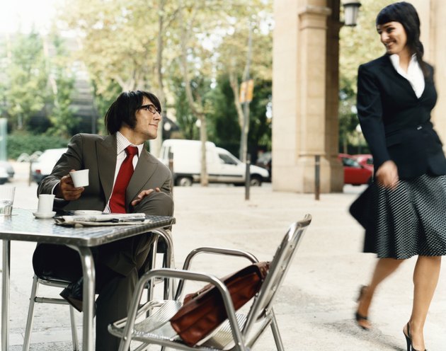 Businessman Looks Pleased as Businesswoman Walks by, barcelona, Spain