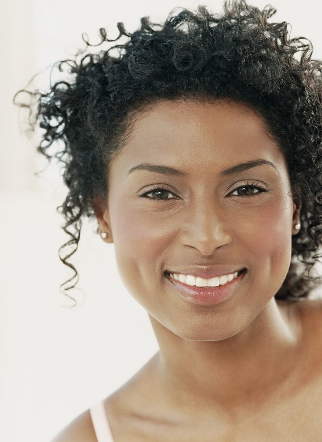 Studio Portrait of a Woman Smiling With Dimples