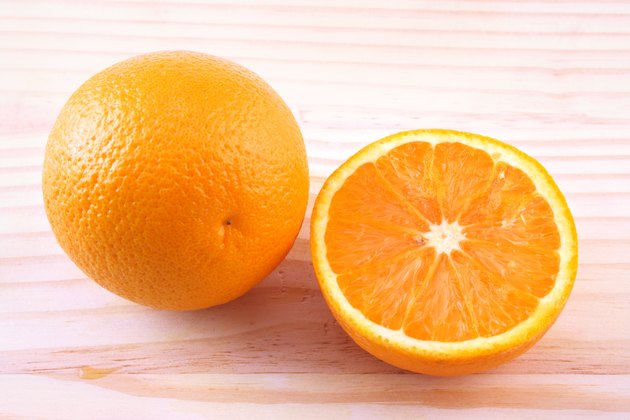 An orange and a orange half