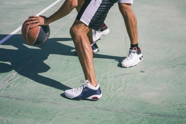 Men playing basketball