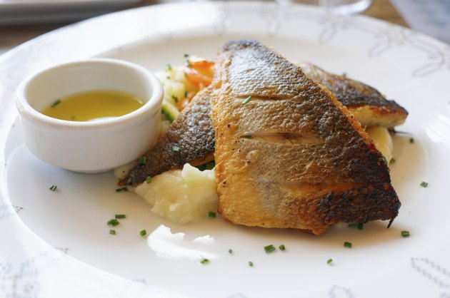 Fried seabass on plate