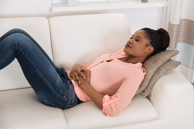 Woman Suffering From Stomach Ache
