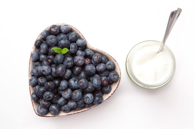 White yogurt and blueberries in a bowl