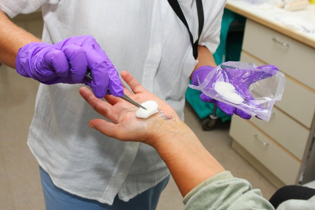 Nurse is taking care of the patient