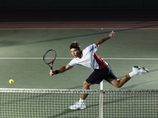 Young man playing tennis