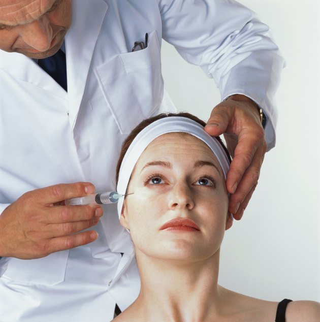 woman receiving an injection by her eye