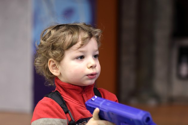 Child with handgun