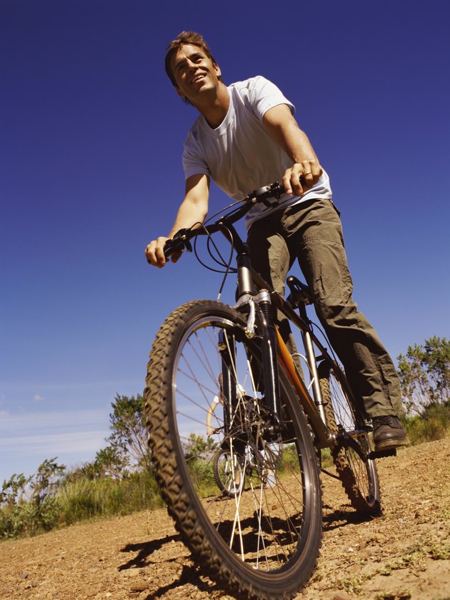 Thirty something Man Riding a Mountain Bike