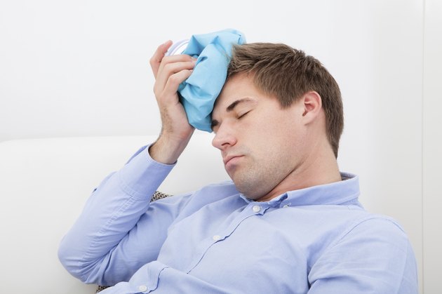 Man Suffering With Headache