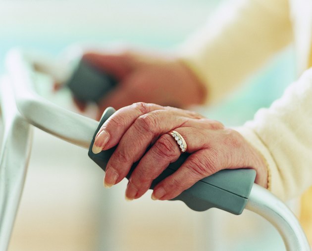 Close-pu of Elderly Woman's Hands on a Zimmerframe