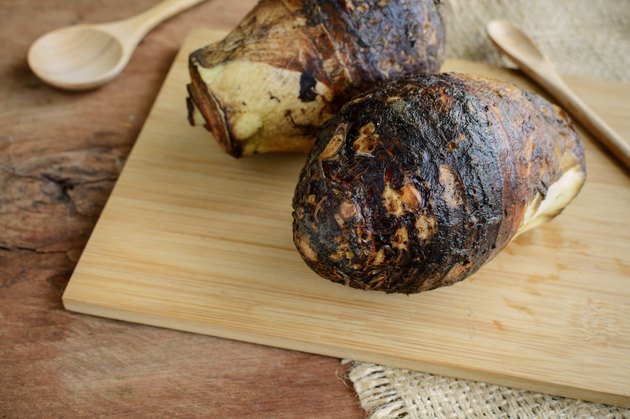 taro root on old wooden table