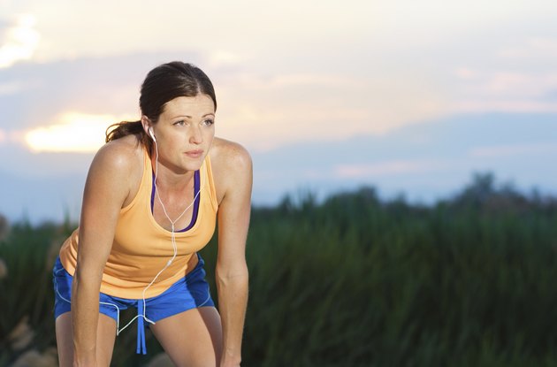 Female Runner finishing a run