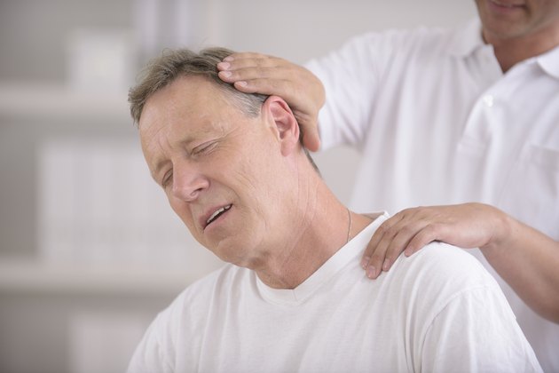 Chiropractic: Chiropractor doing neck adjustment