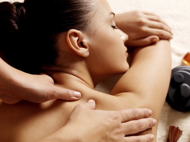 Woman having massage in the spa salon