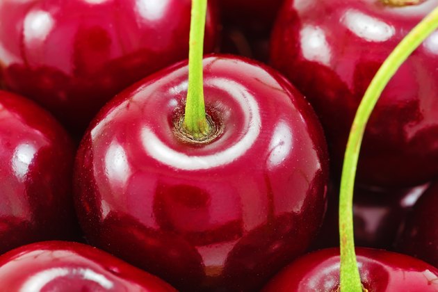 Sweet red cherries as a background
