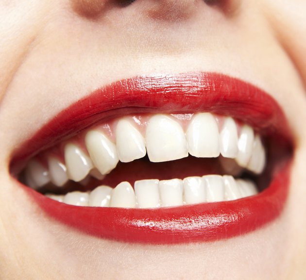 Healthy woman teeth and smile. Close up.
