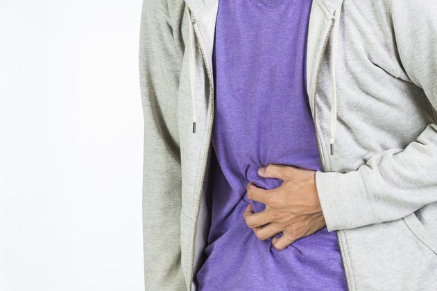 Man suffering from stomach pain