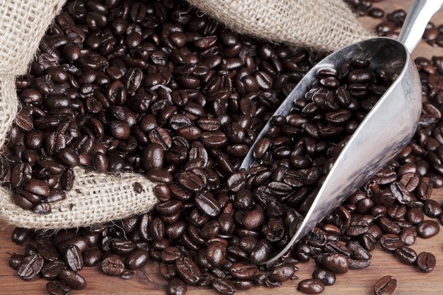 Coffee sack with scoop and beans.