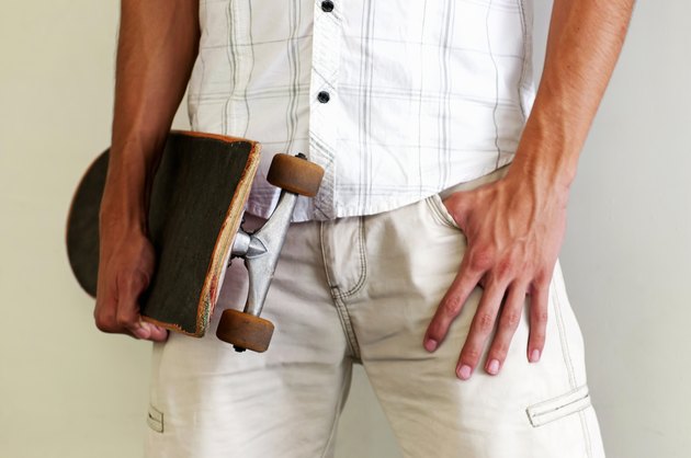 Teenager boy with skateboarding