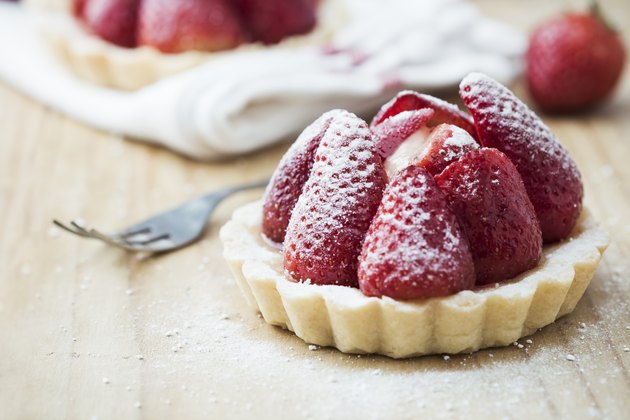 Strawberry tart on wooden table