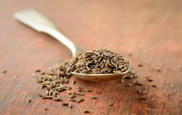 cumin in spoon