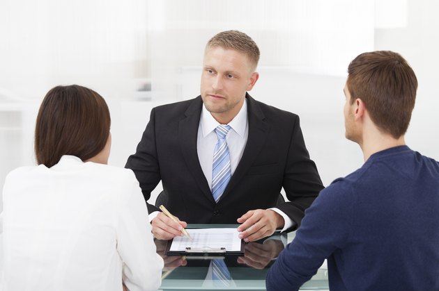 Couple Consulting Financial Advisor