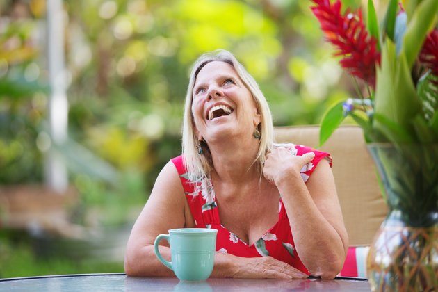 Laughing Woman Sitting at Table