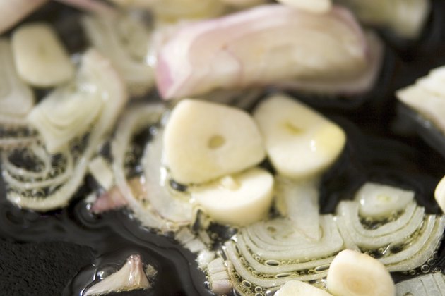 horizontal,sliced,cooking,garlic,oil,dish,food,frying pan,onion,photography,cut,frying,meal,preparation,indoors,preparing,appetizing,ingredients,flavor,edible,close up,chopped,nobody,food and drink,color image,eatable,food stuff,02a1039f,ingram