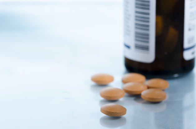 pills over blue table