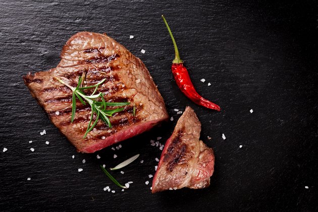 Grilled beef steak with rosemary, salt and pepper