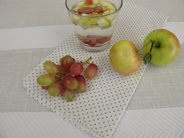 Detox water with apple and red grapes