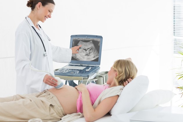 Doctor performing ultrasound