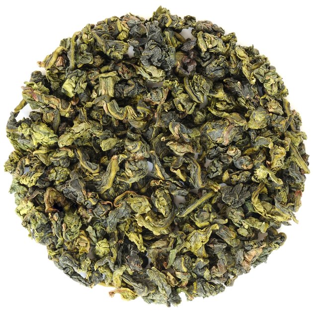 Oolong Fujian Anxi Benshan in round shape isolated