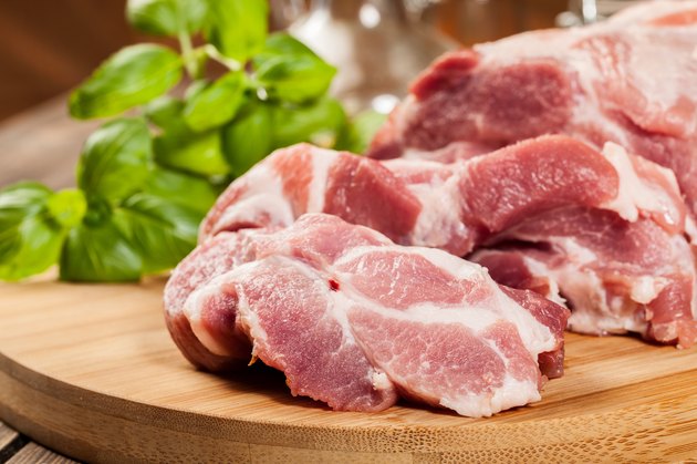 Raw pork on cutting board