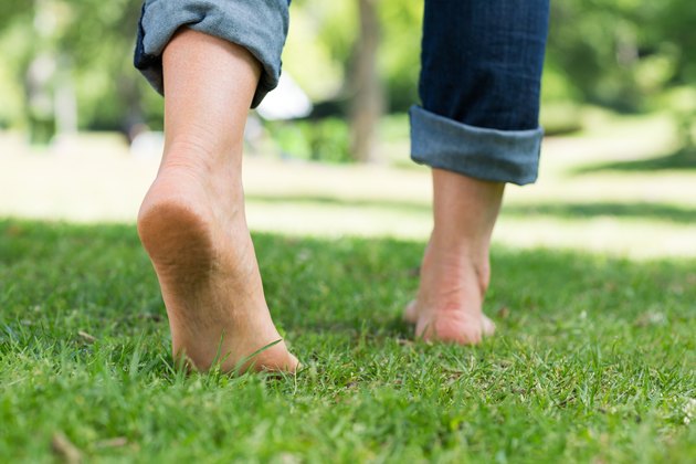 Woman walking on grass