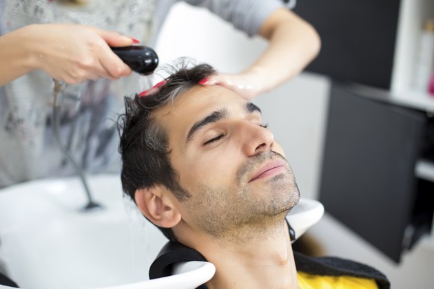 Young man at hairdresser