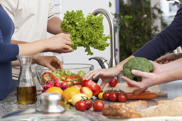 Friends making a salad