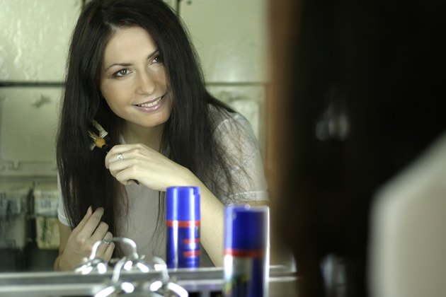 woman brushing hair