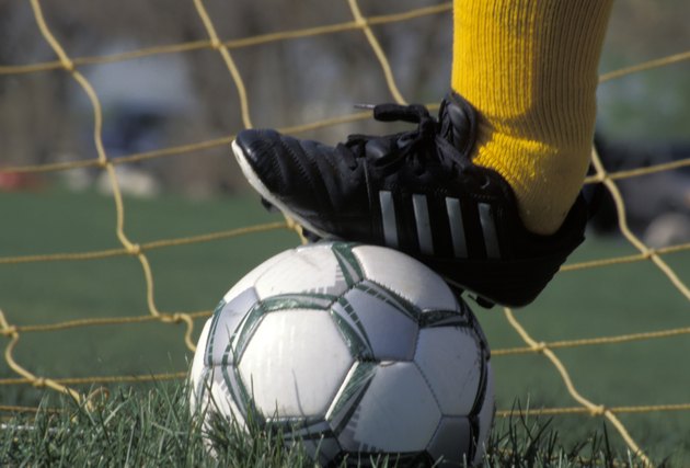 Goalie With Foot on a Soccer Ball