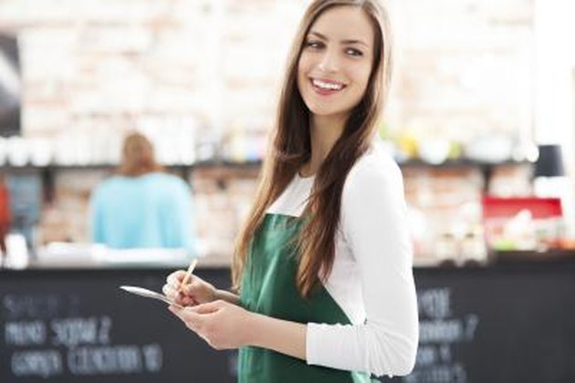 Portrait of waitress in cafe