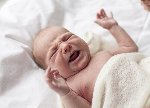 Closeup of newborn baby crying